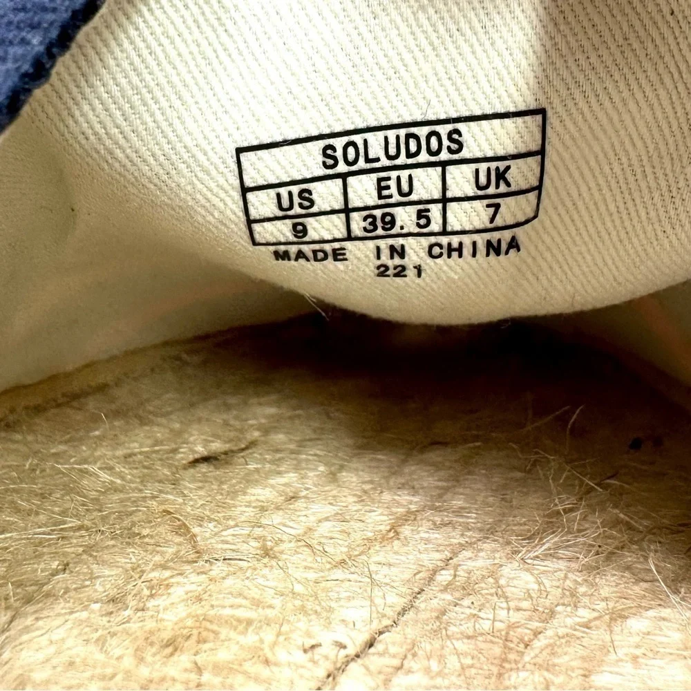 Soludos The Dali rainbow striped espadrilles navy background recycled cotton 9